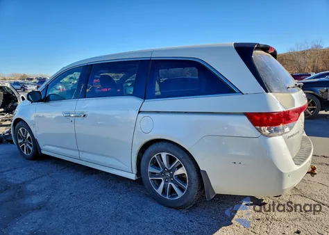 2014 Honda Odyssey Touring z USA, uszkodzony, nr VIN 5FNRL5H95EB024723